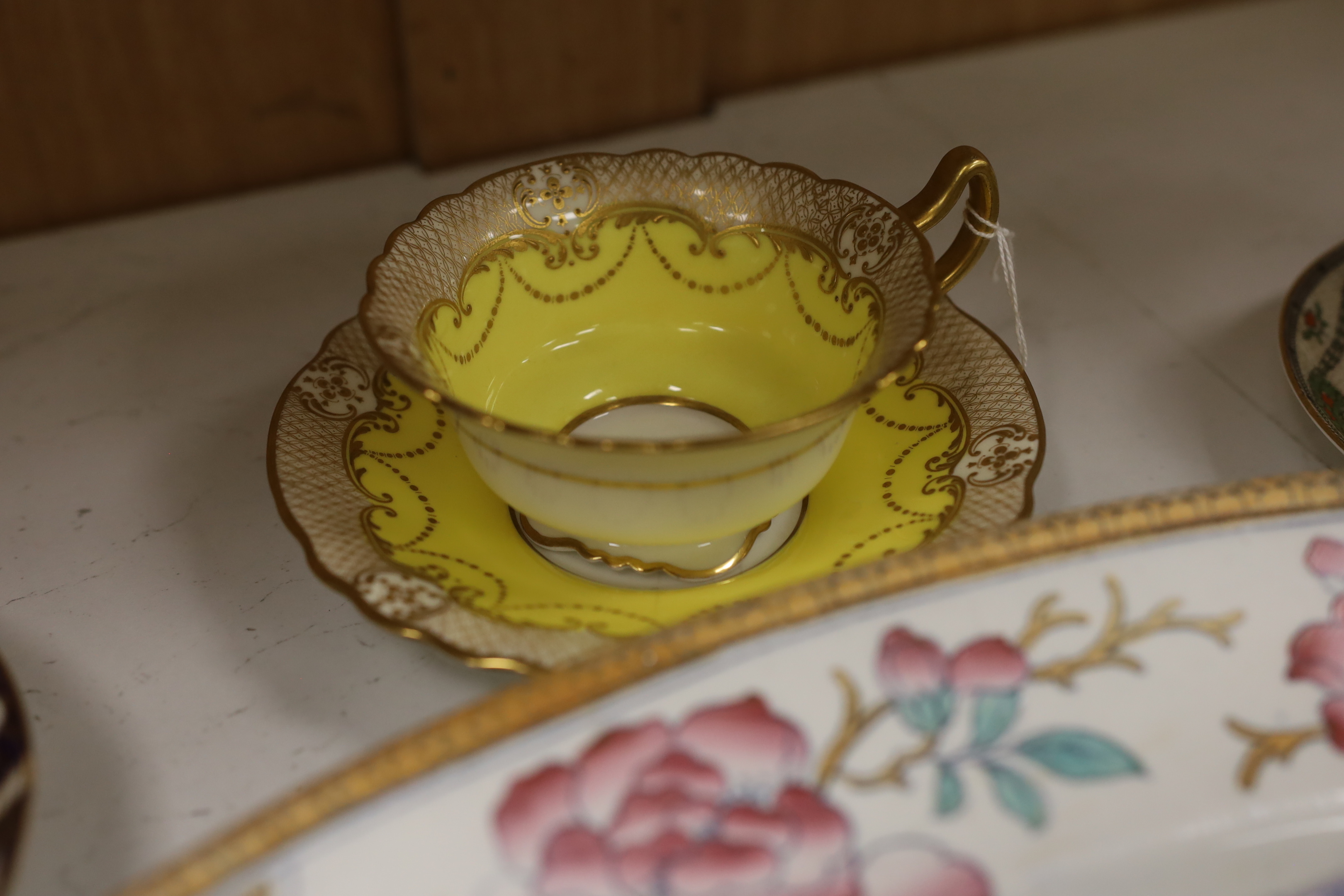 A Victorian stone china oval meat platter, a Derby cup and saucer, two others and two Spode ‘Italian’ plates, platter 50cm wide